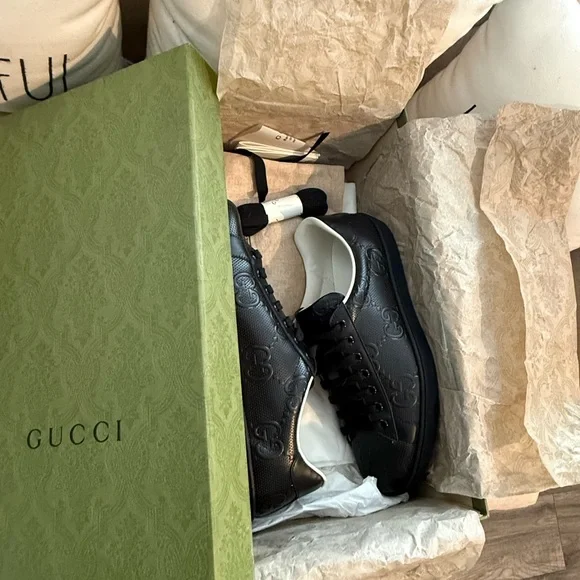Gucci Black Embossed GG Leather Low-Top Sneakers